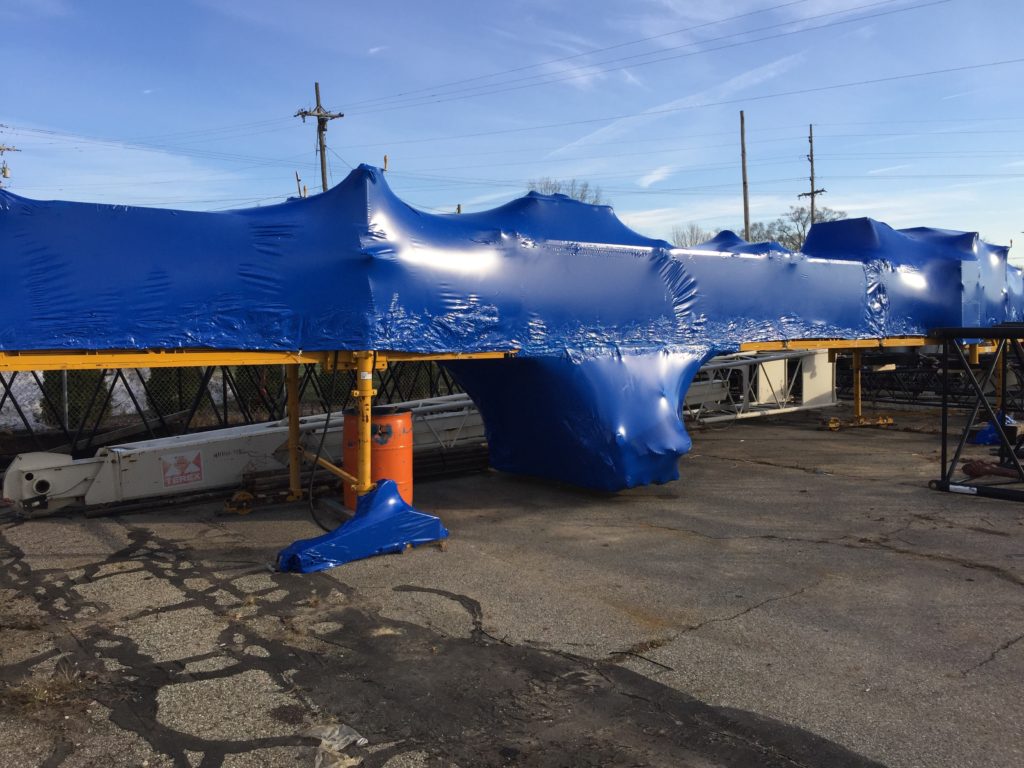 shrink wrapped equipment outdoors